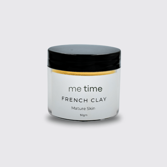 Fine turmeric and clay powder showing smooth, creamy texture