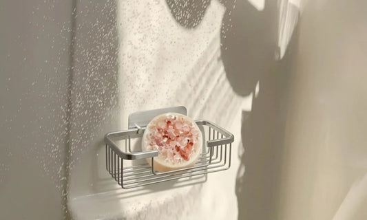 Wet handmade Me Time soap bar with water droplets, bright natural light