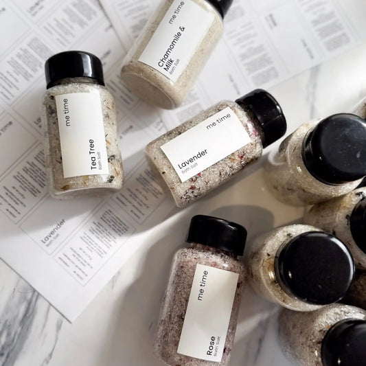 Four natural bath salts arranged as a calming self care gift set