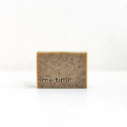 Bar of soap with 'me time' text on a white background