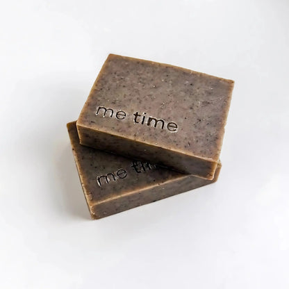 Black Seed natural handmade soap bar with black seed oil and ground seeds, photographed on a neutral background, cold-process texture visible, minimal packaging.