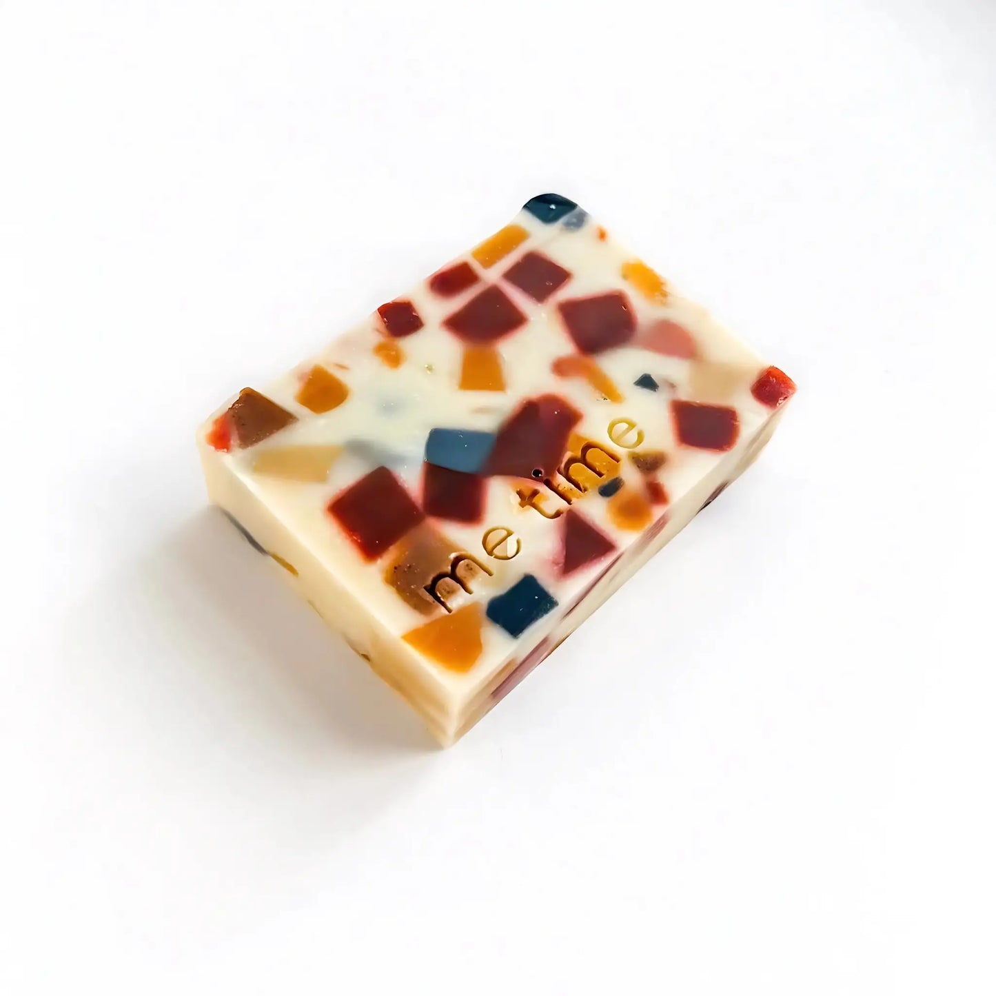 Zoom on the smooth, creamy surface of the bar, showing natural oils and slight texture of kaolin clay.