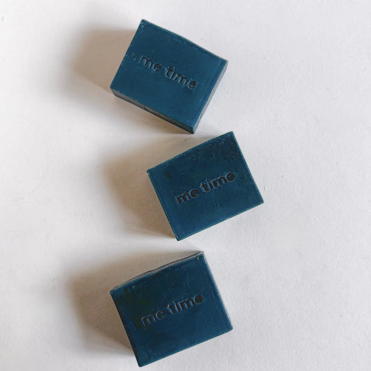 Cold-process handmade soap bar with indigo powder and clove bud oil