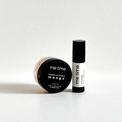 Natural lip balm and exfoliating scrub with botanical ingredients in cotton bag