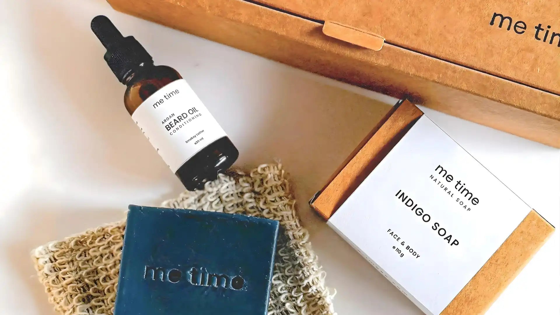 me time beard oil, bar of soap, and box labeled 'me time' on a light background. made in UAE