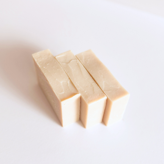 Handcrafted licorice soap with anise fragrance, enriched with licorice root powder for brightening and hydrating the skin, featuring a creamy lather for a soothing and luxurious cleansing experience.