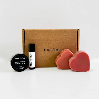 Pamper Me Gift Box – A handmade self-care set featuring heart-shaped soaps, lip balm, lip scrub, and a surprise product.