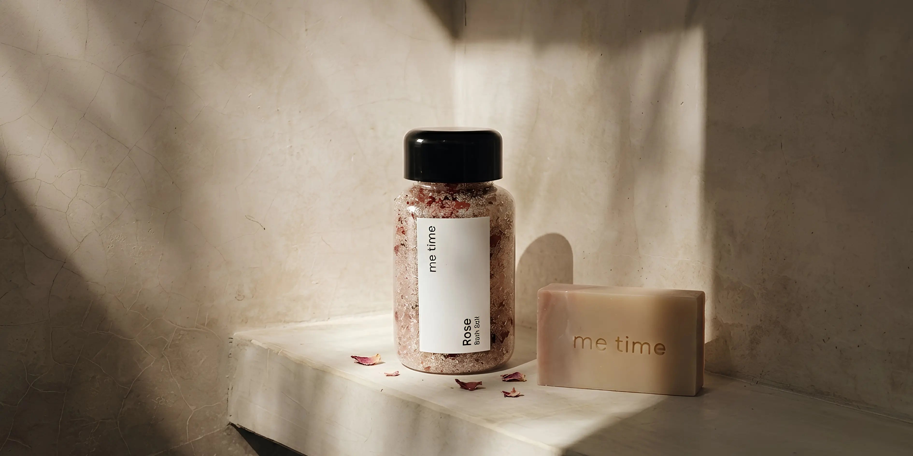 Bottle and bar of soap with 'me time' label on a textured surface