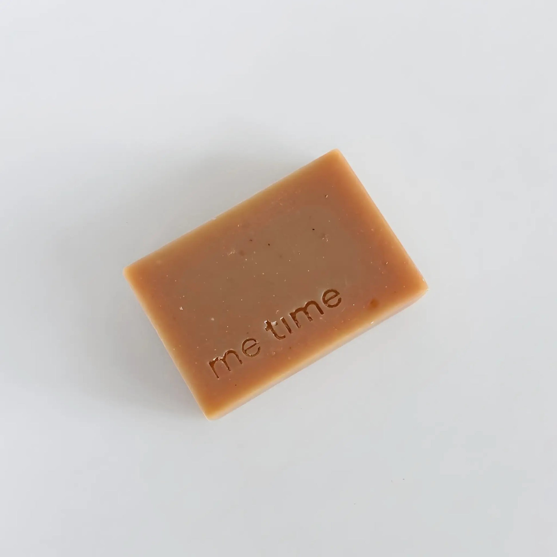 Chamomile & Vanilla Natural Soap angled view, showing handcrafted texture, soft cream color, calm and soothing appearance