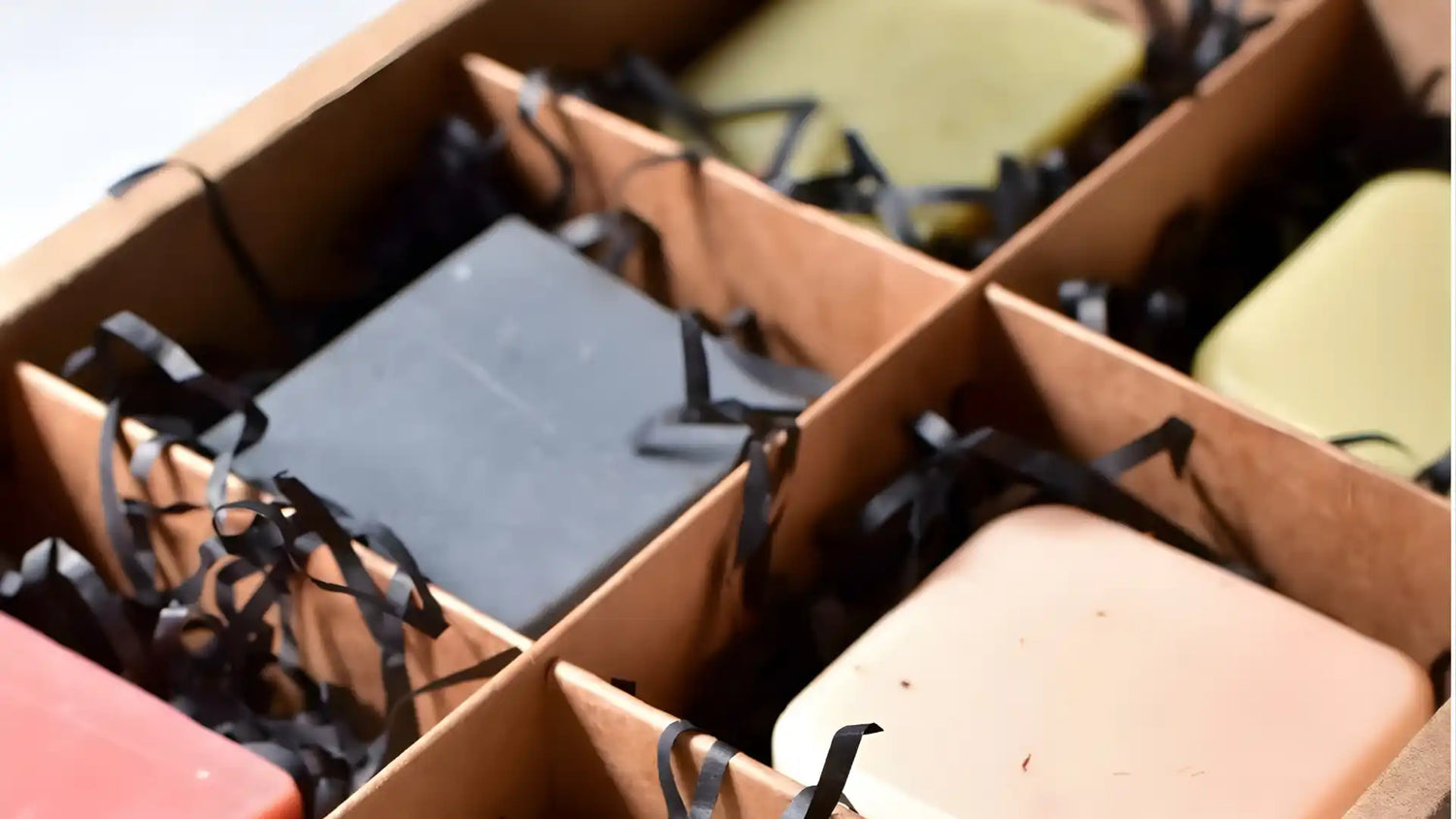 me time mini soaps made in UAE in a cardboard box with black ribbons