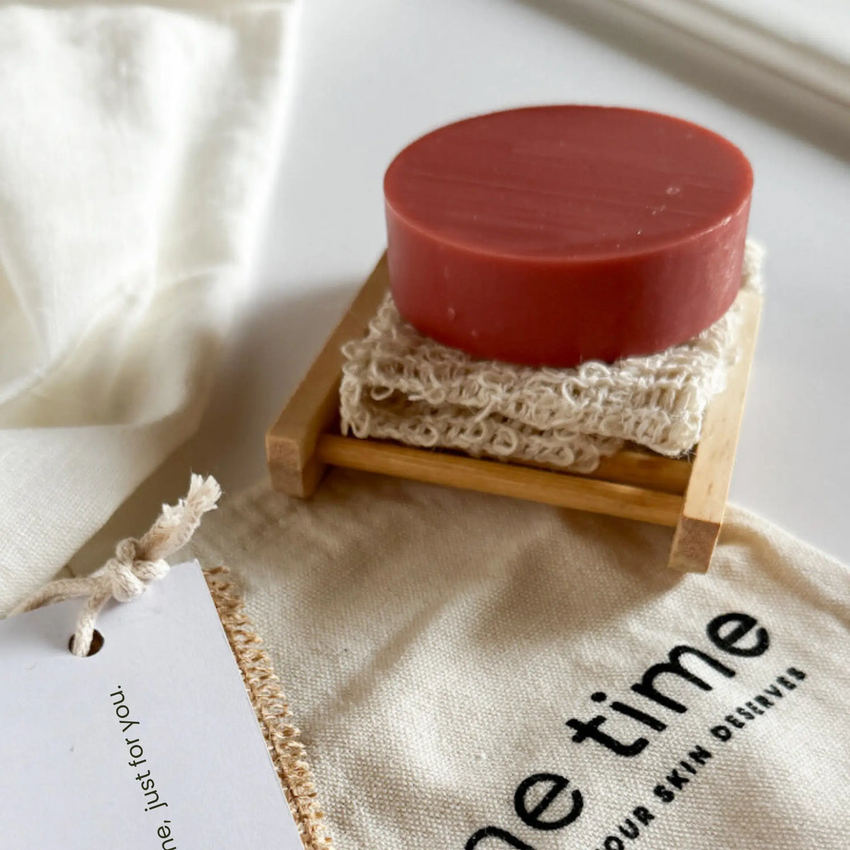 Pink Clay Soap with natural soap pouch and wooden dish in the Gift of Love set
