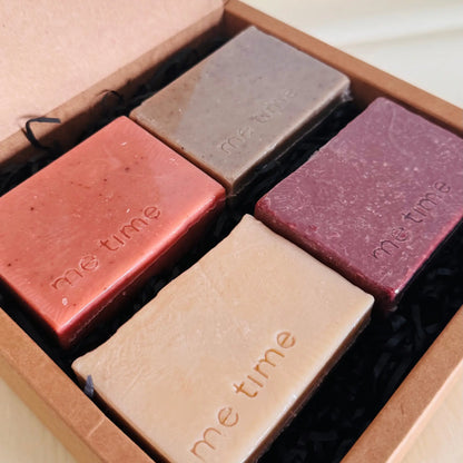 Close-up of the four Heritage bestselling soap bars, showing their colours and handmade textures