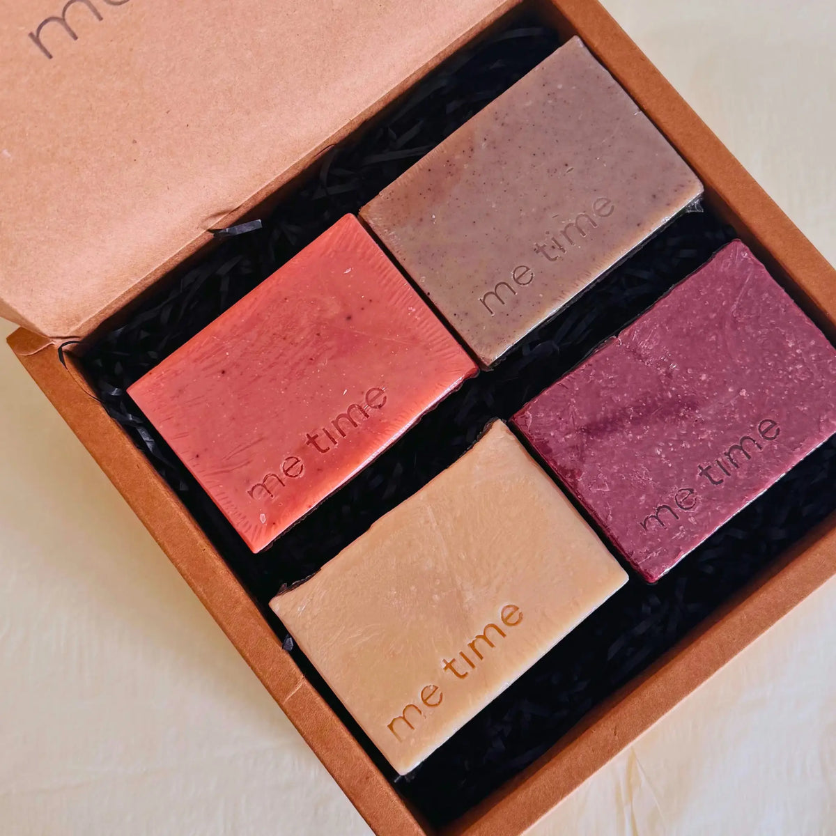 Open Me Time gift box containing Damascus Rose, Moroccan Clay, Camel Milk and Frankincense, and Black Seed soaps