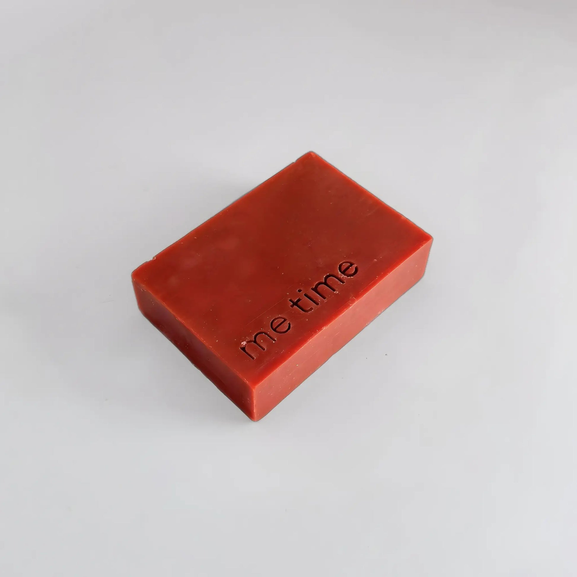 Rhubarb bar of soap with 'me time' text on a light gray background