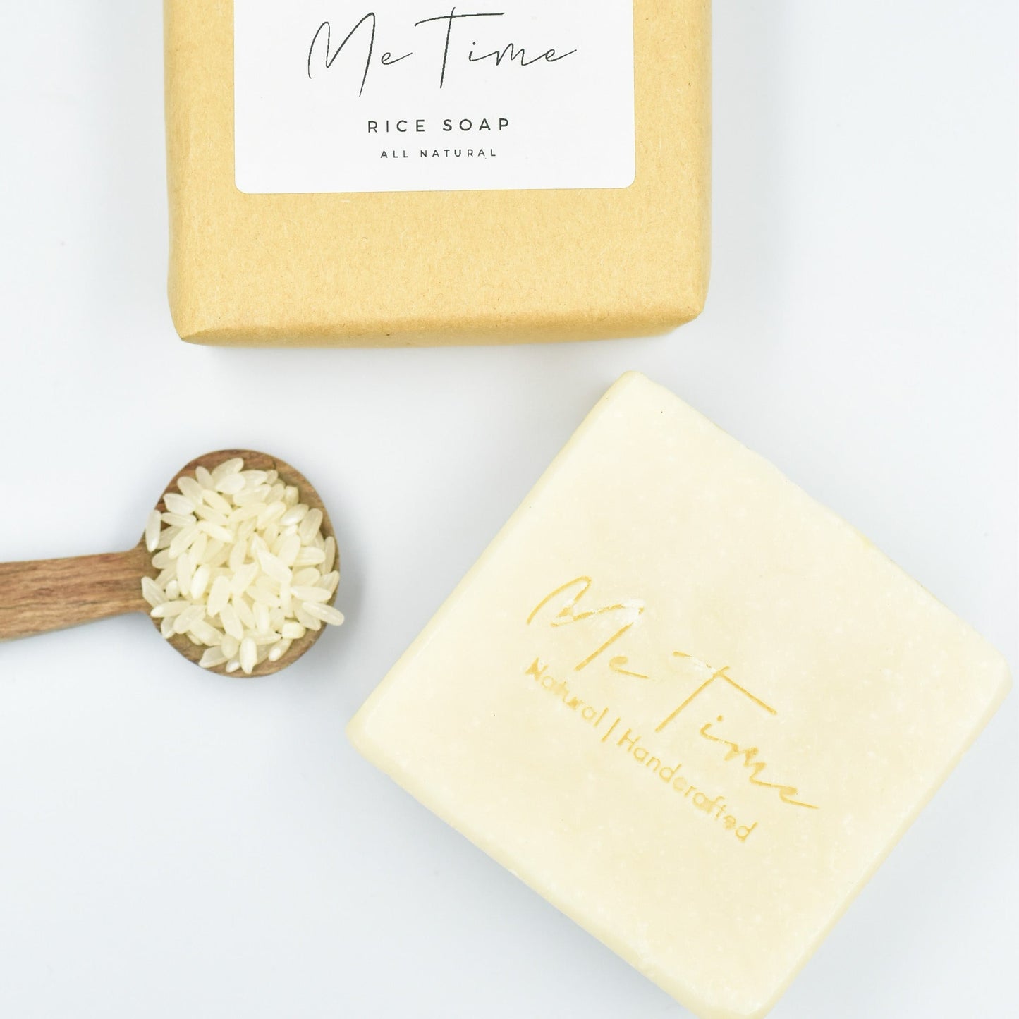 Handmade natural artisan soap bar with rice and rice water, featuring gentle exfoliation and deep hydration properties. The soap is crafted with palm oil, olive oil, coconut oil, and castor oil, with a natural rice fragrance.